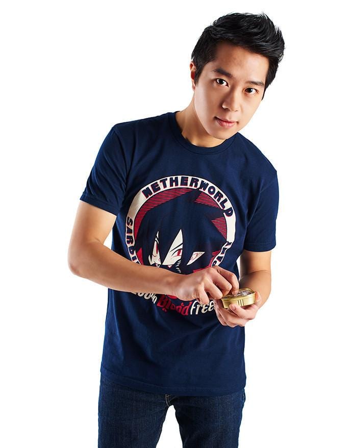 An image of the Netherworld Sardine shirt. It is a navy shirt with off-white and red illustration in the center.